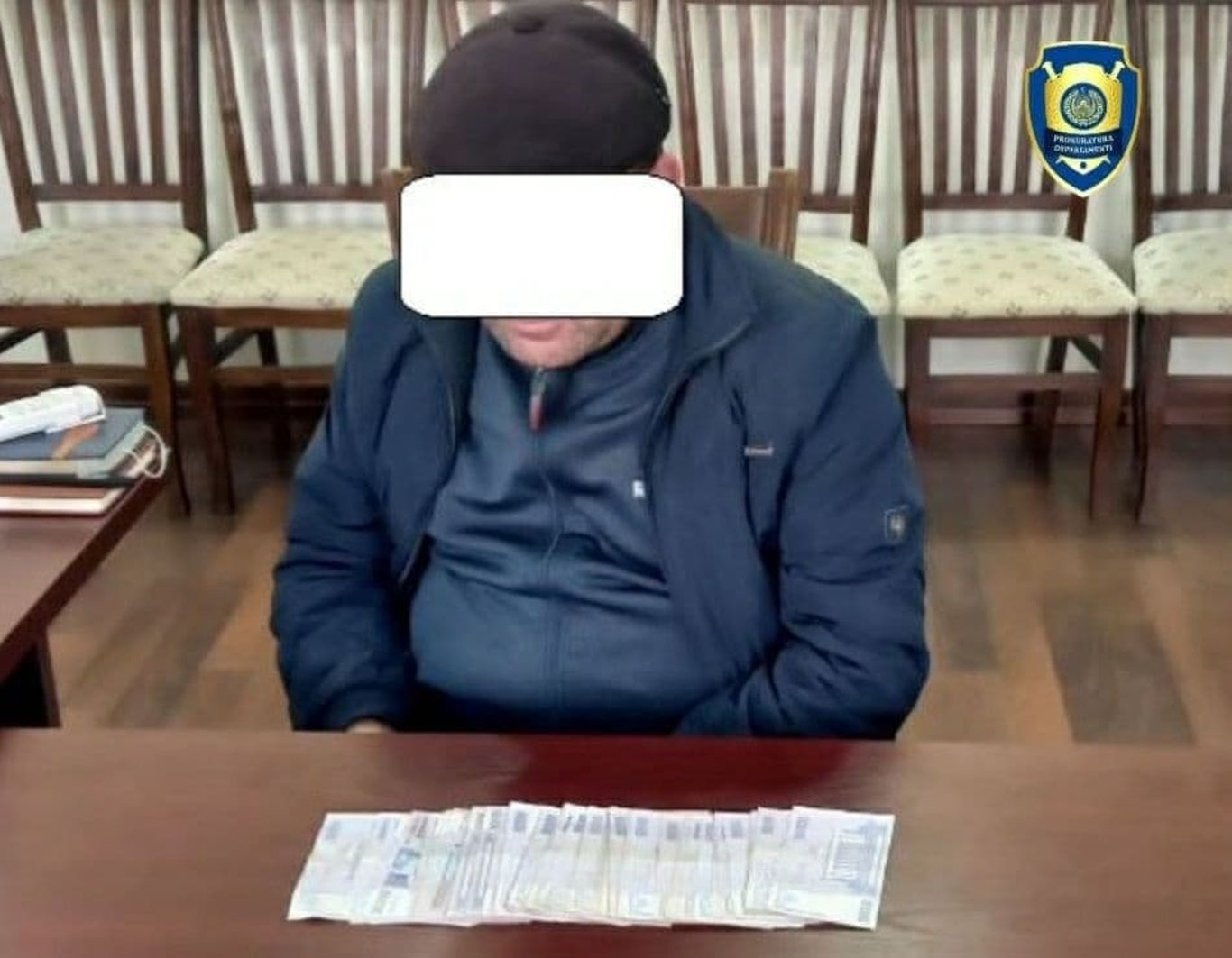 Firibgarlik navbati mahalla raisiga: Farg'onada raisga jinoiy ish ochildi