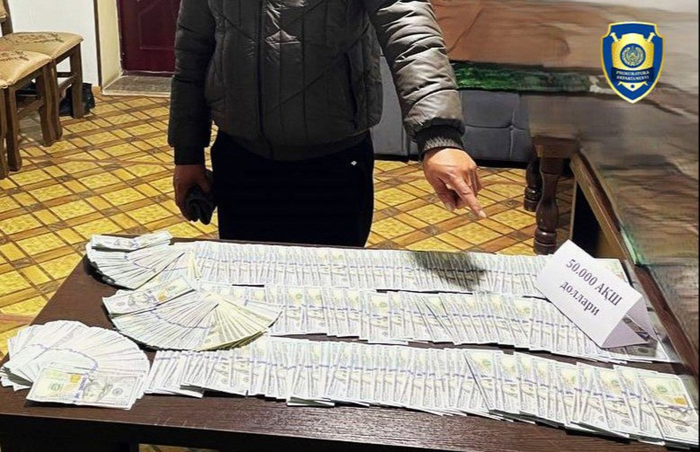 Andijonda MJCH rahbari 50 ming dollar pora bilan ushlandi